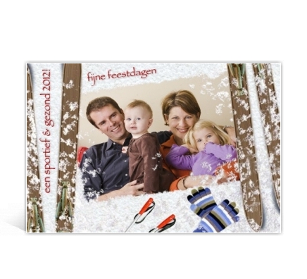 Voorbeeld foto kerstkaart met skies