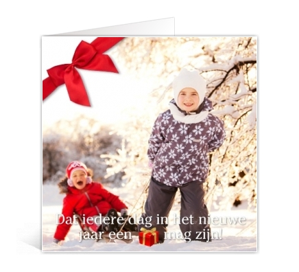 Voorbeeld foto kerstkaart met sneeuwfoto en strik
